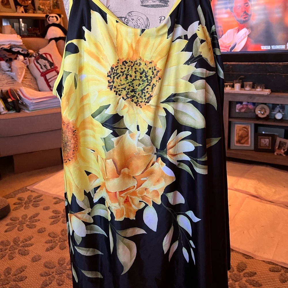 Tankini set. Brand new. Beautiful yellow floral. Black short  bottoms. 3X